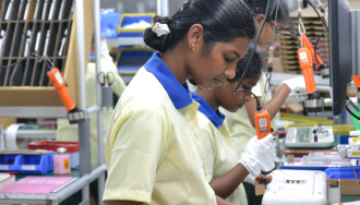 Employees working at the Chennai Plant