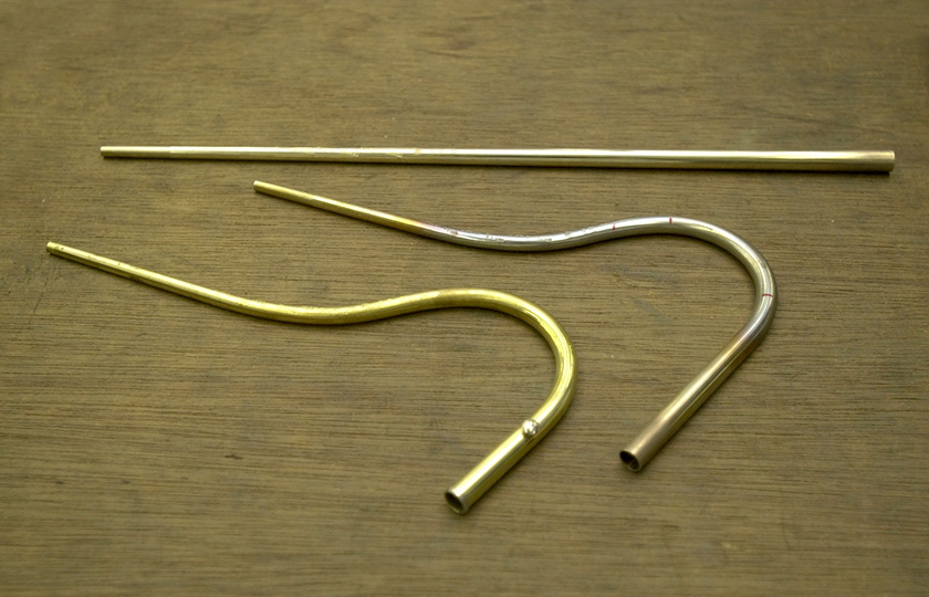 Thin, conical tubes after heating and bending