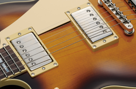 The silver parts are pickups. The photo depicts humbucking pickups, which feature two coils under metal covers.