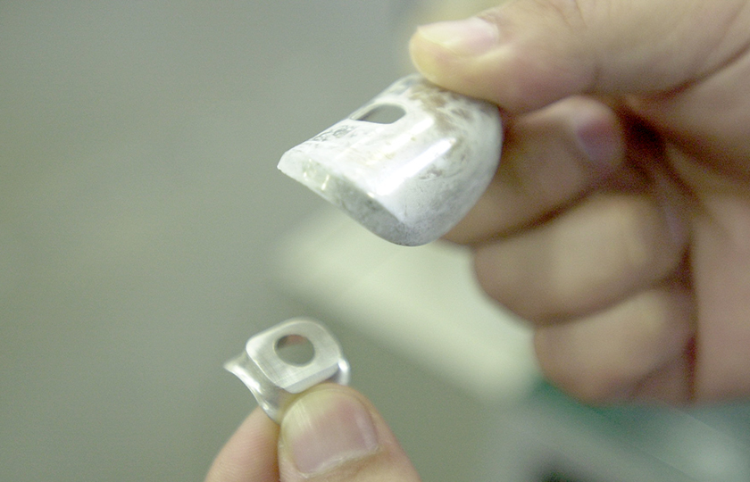 Lip plate and riser (foreground) during assembly