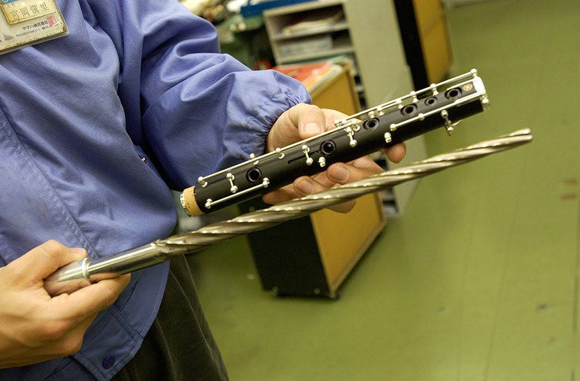 An oboe pipe and a reamer for shaving the internal surface