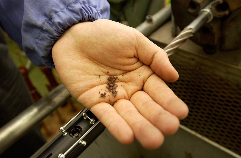 Grenadilla shavings are reddish brown.