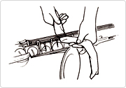 Roll a polishing cloth into a long strip and clean the keys, being careful not to put pressure on them.