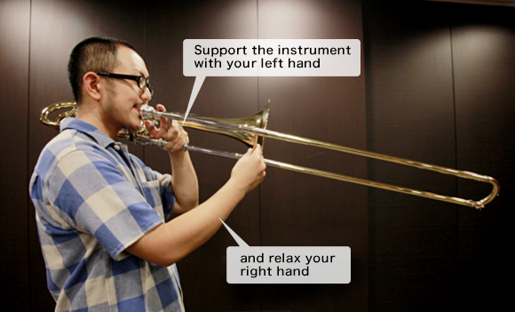 Holding the trombone