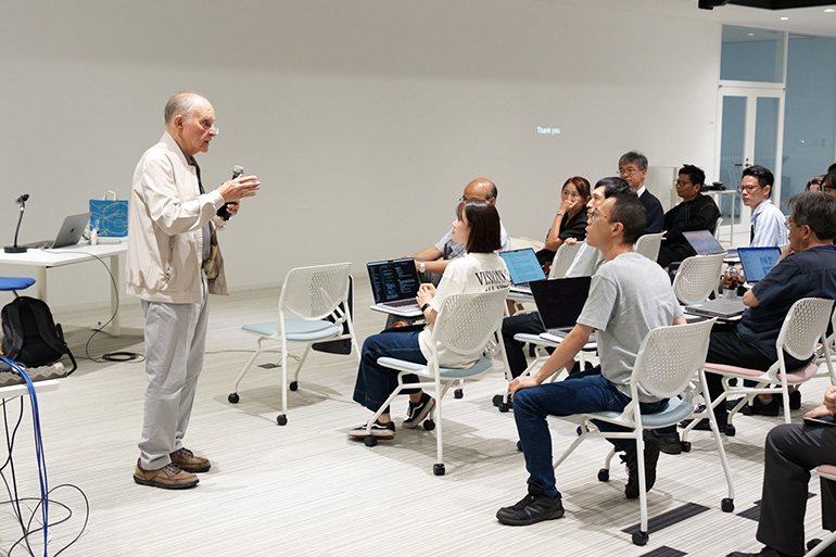 [Photo] Dr. Chowning speaking at Yamaha (2024)