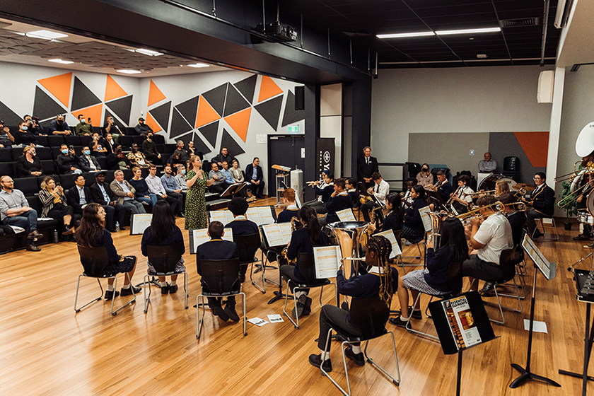 Sunshine College and their music teacher performing for families accompanied by Yamaha Australia artists "Horns of Leroy" at their first performance.