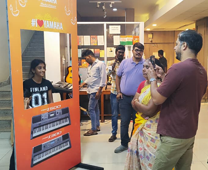 Visitors capturing memories at the Yamaha selfie stand