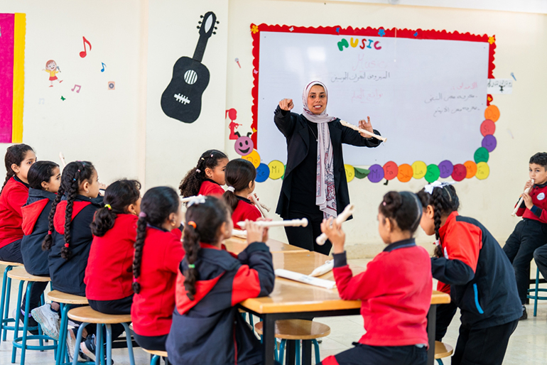 [Image] Egyptian children taking music class using the recorder seriously
