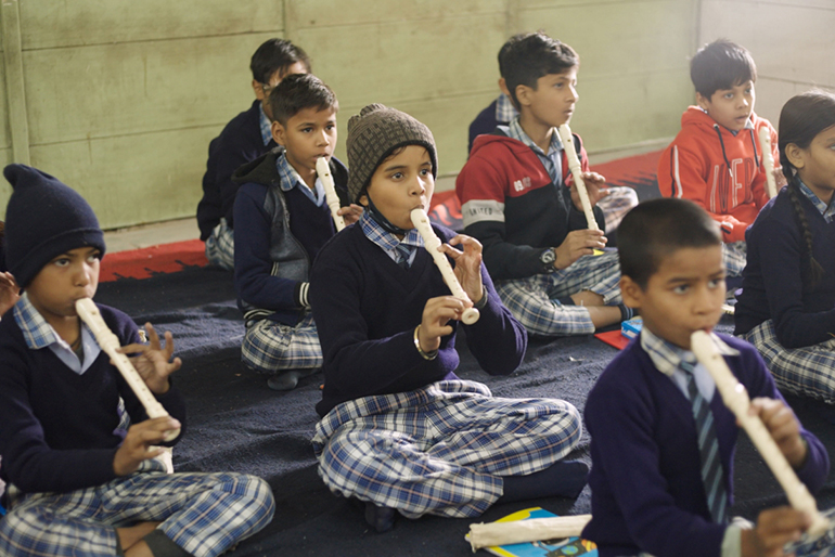 [Image] A music class using the recorders in India
