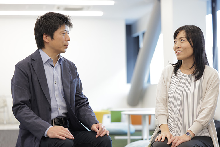 [Image] Photograph of developers in an interview