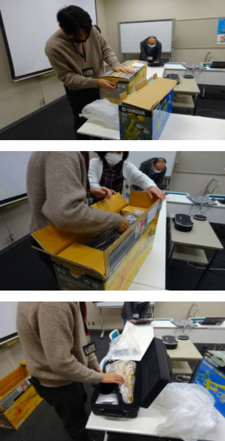 [Photo] Experiencing the unboxing. The project members believed that turning the first encounter with the “partner” (the instrument that will be by your side for a long time) into a special experience could foster attachment to both the instrument and Yamaha.