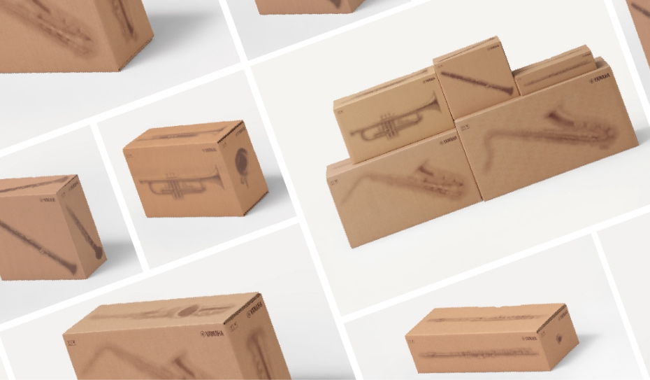 [Photo] Newly designed instrument packaging boxes with illustrated musical instruments.