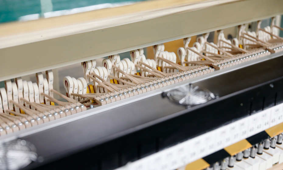 [Photo] Image of a piano key action durability test