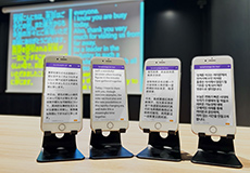 [ 画像 ] インターネット不要で来場者のスマートフォンに音声・字幕を配信<br>
ローカル型 音声・字幕システム「スマホでレシーバー」を発売<br>
～「Interop Tokyo 2026」の基調講演会場で採用、当社ブース出展 ～