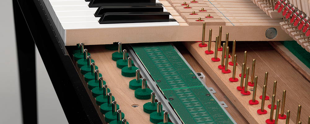 inside look of the transacoustic piano keys