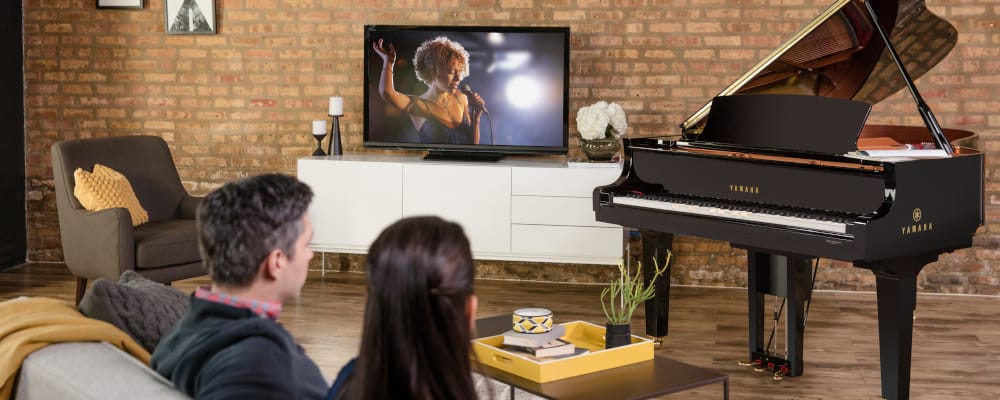 image showing yamaha disklavier piano in a living room