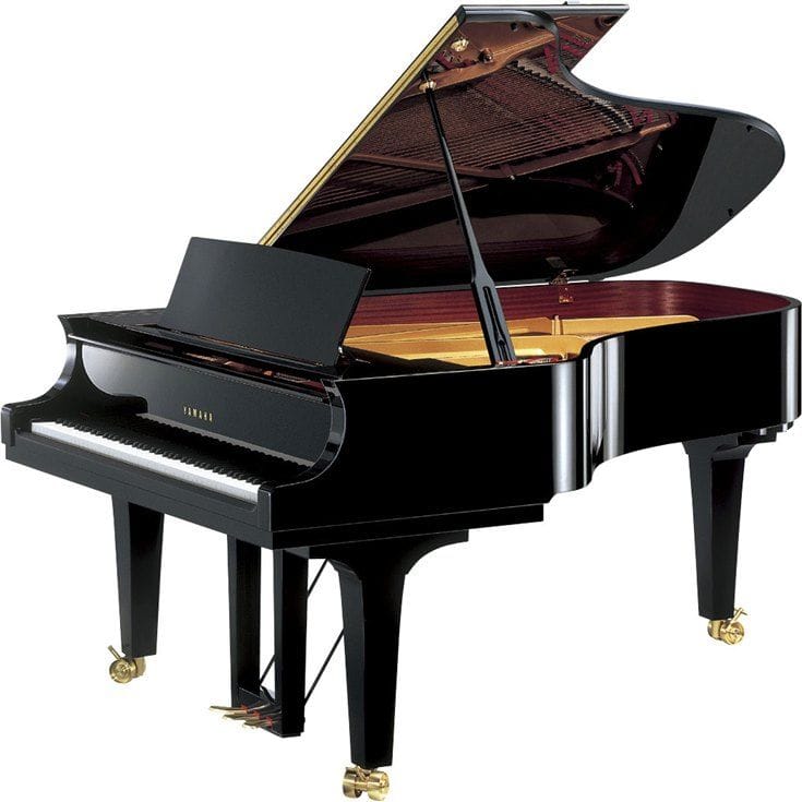 Yamaha grand piano with lid open viewed from right side.