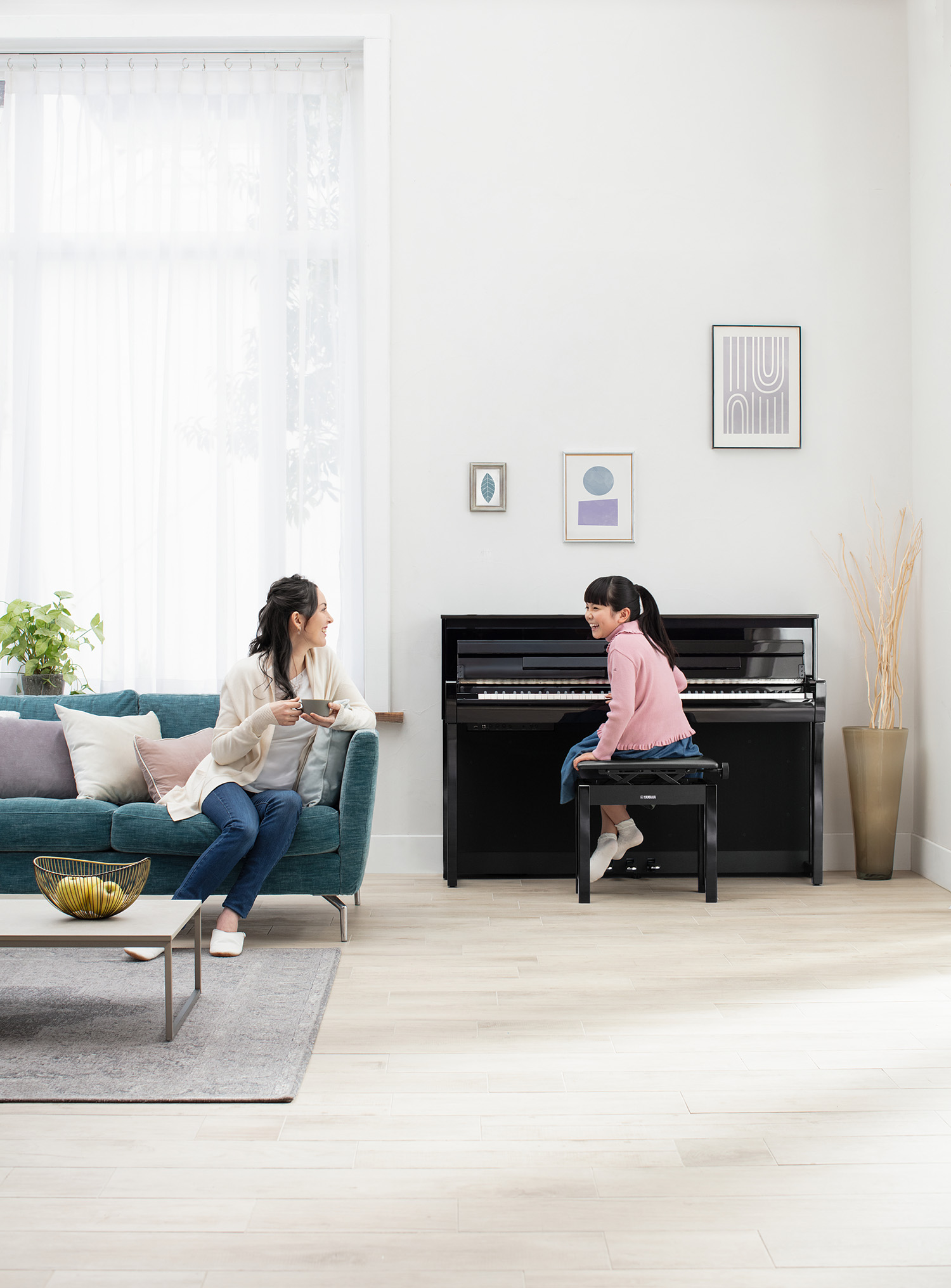 A Yamaha grand piano with lid removed and viewed from above to see entire interior.