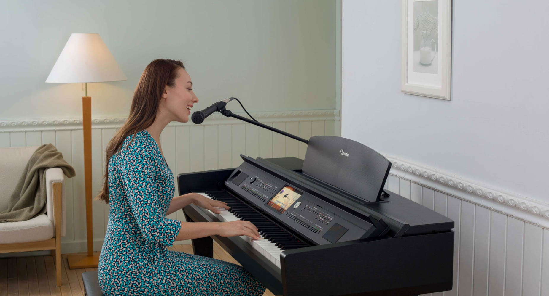 happy woman playing the clavinova piano