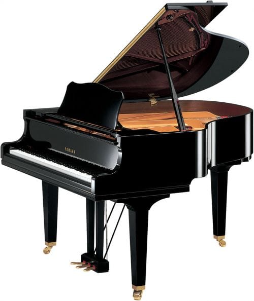 Image of small Yamaha baby grand piano with lid open viewed from right side.