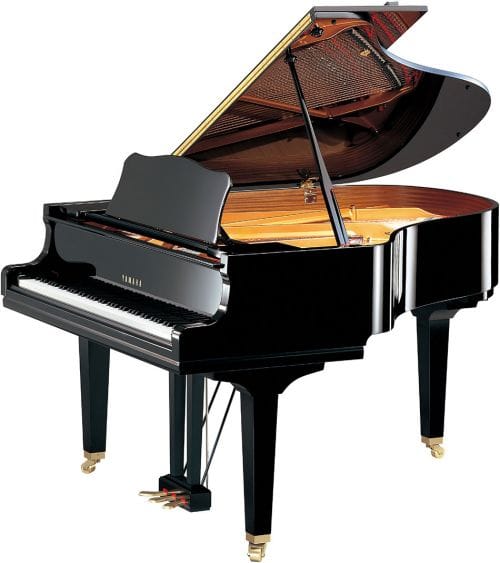 Yamaha baby grand piano with lid open viewed from right side.