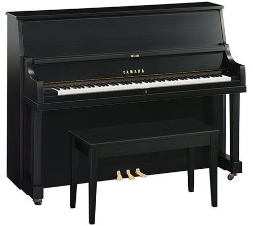 A Yamaha upright piano with a bench.