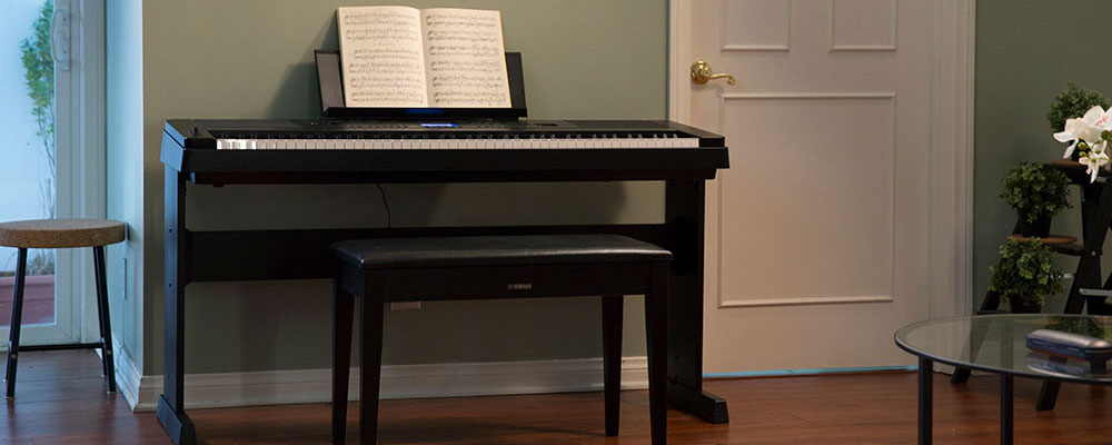 Lifestyle image showing digital keyboard with stand