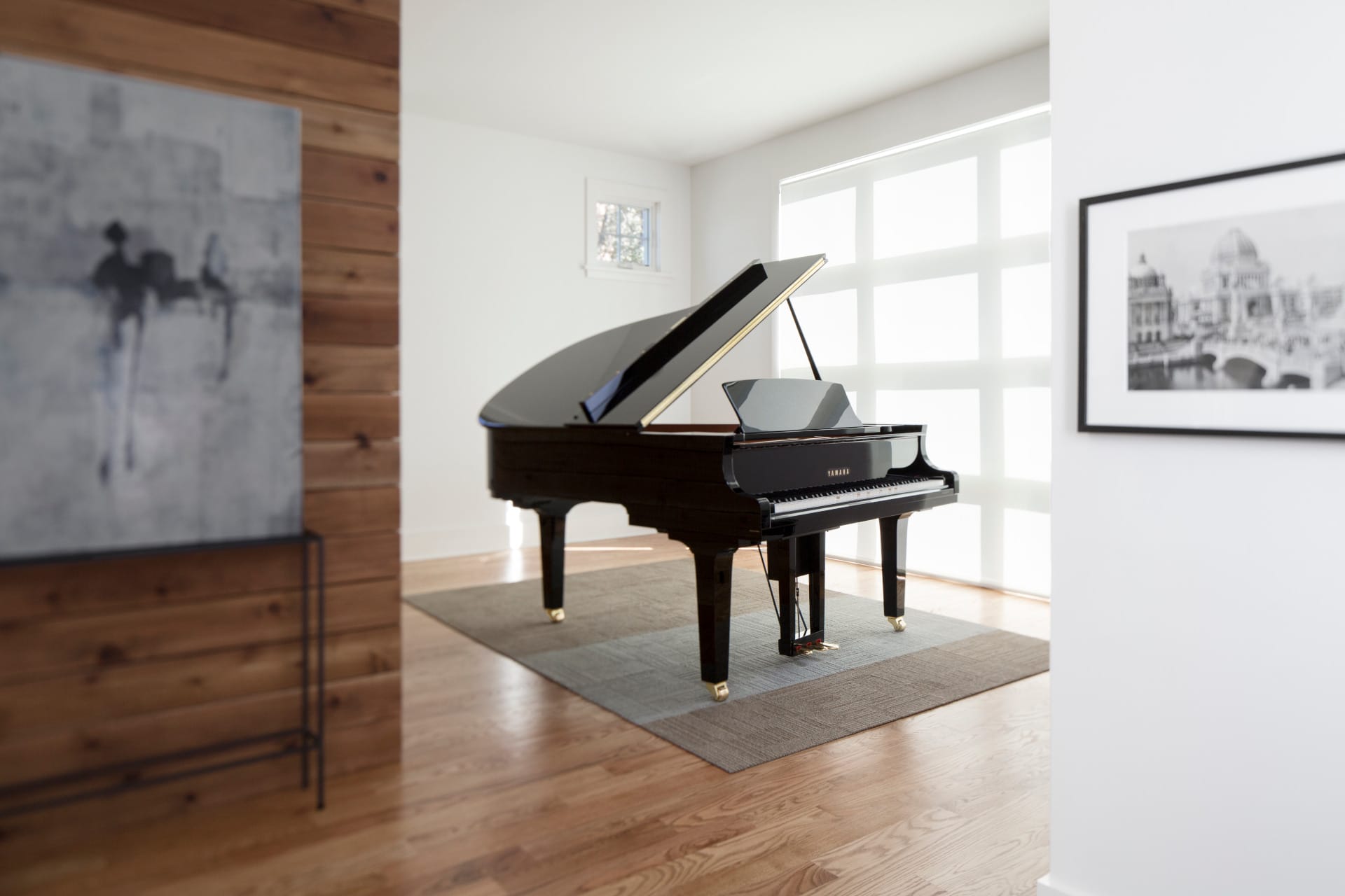 lifestyle image showing yamaha disklavier piano in a room