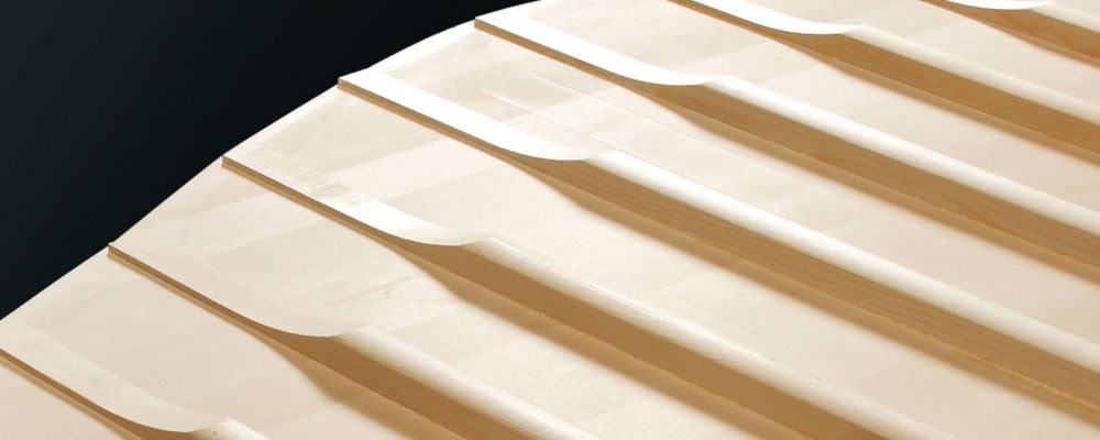 A row of milled boards unassembled and unfinished.