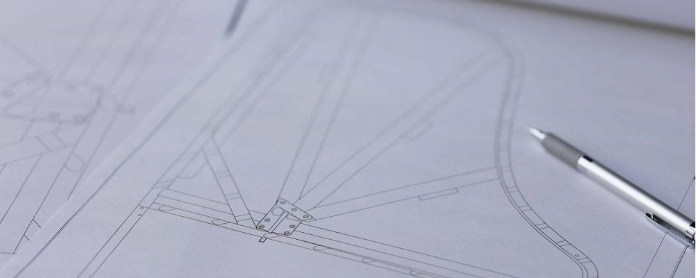 Image showing a piano design drawing on a pad with a pen.