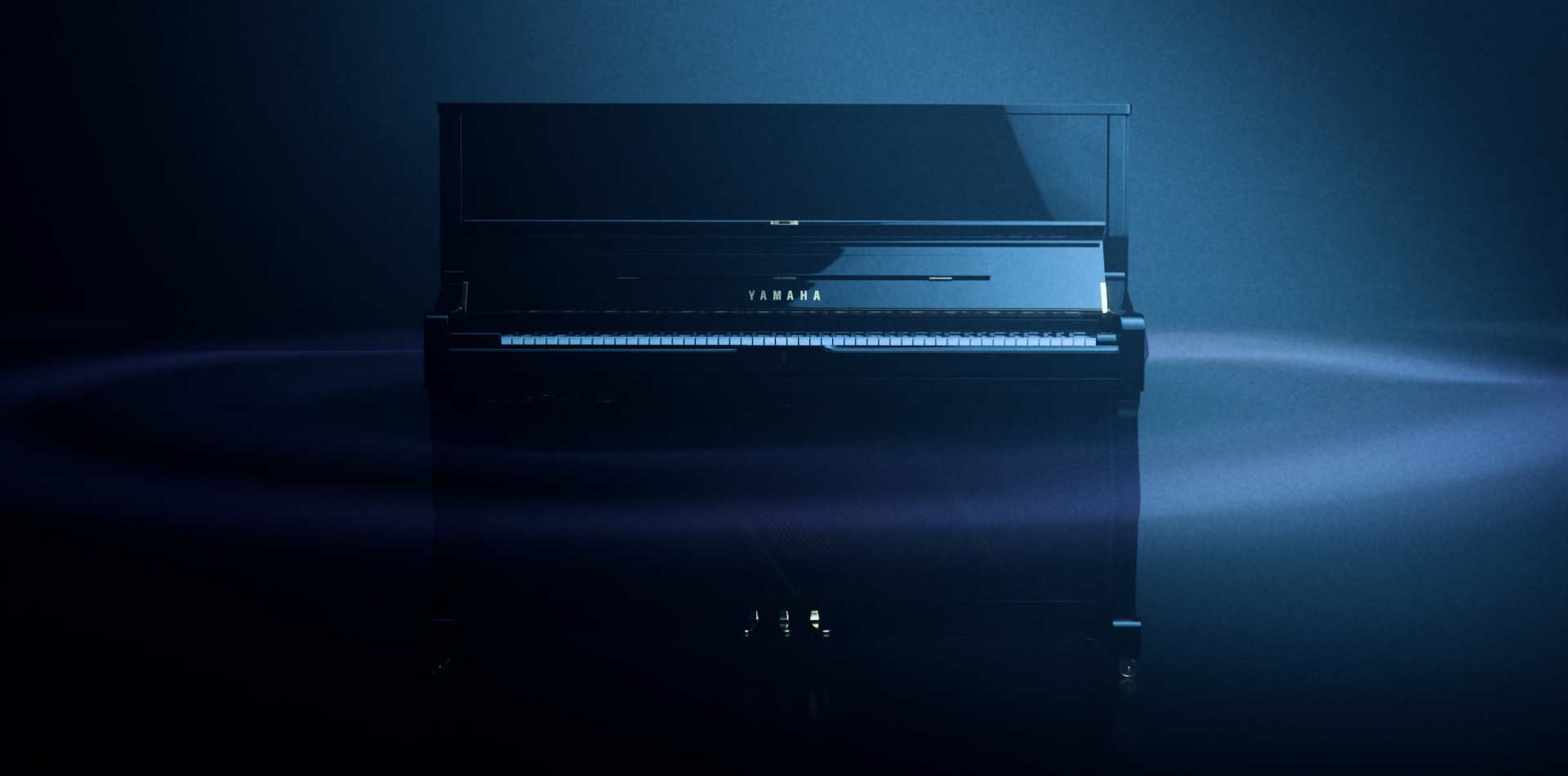 transacoustic piano in a midnight blue surrounding 